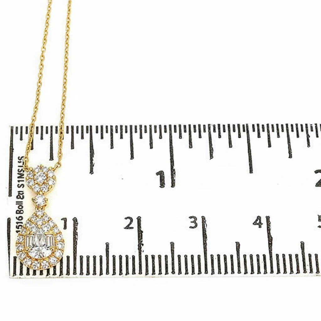 4095-18k-gold-pear-shaped-baguette-diamond-necklace-67308-4.webp 18K Gold Pear-Shaped Baguette Diamond Necklace 67308